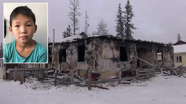 Boy, burnt down house