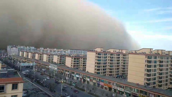A massive sandstorm is seen sweeping through the city of Zhangye in northwest China's Gansu province
