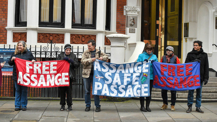 Click to enlarge free assange