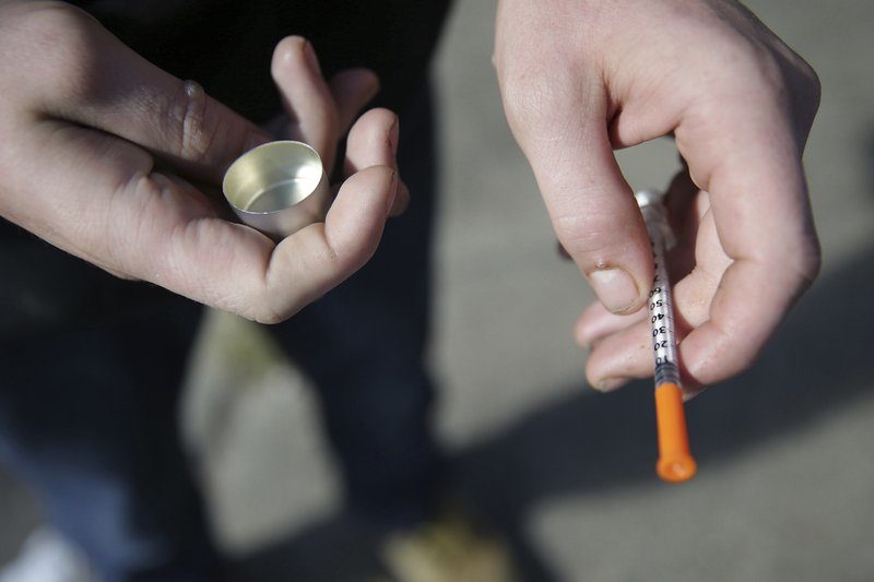 Click to enlarge fentanyl user with a needle