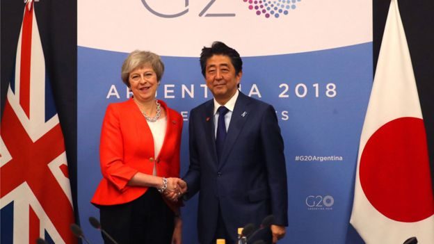 Click to enlarge Shinzo Abe Theresa may