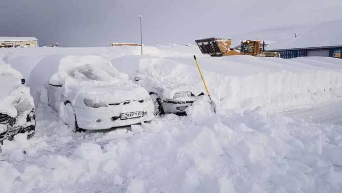 Cars completely buried in snow after storm engulfs Akureyri in Iceland