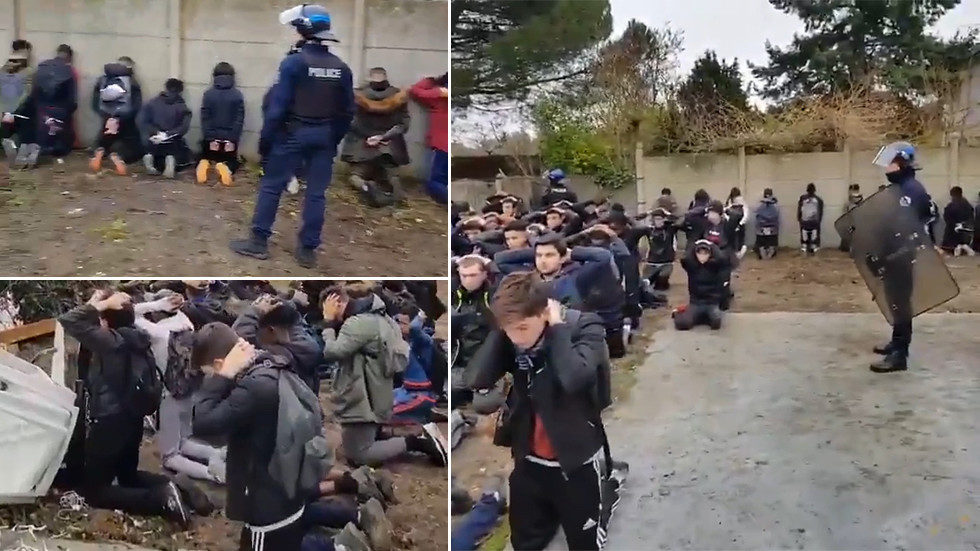 Click to enlarge French police arrest student protesters