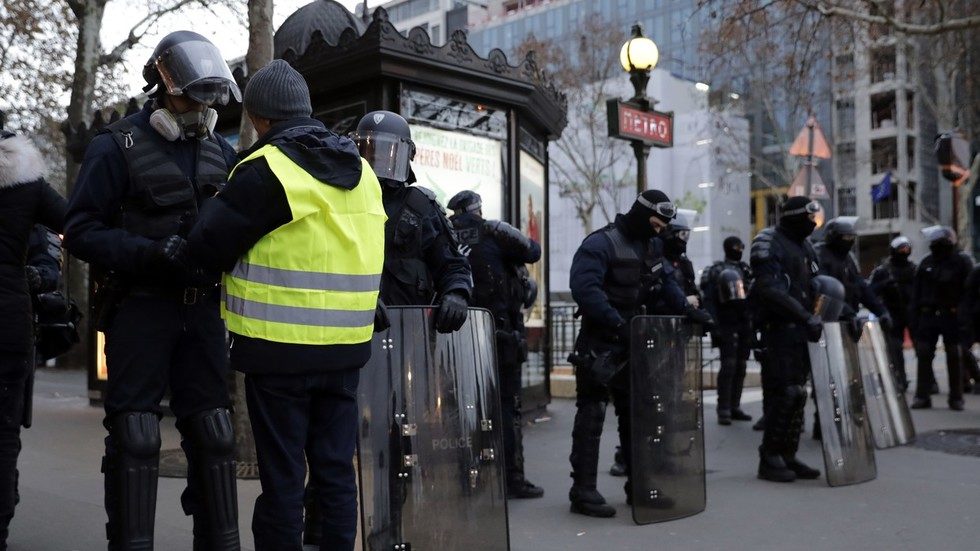 Riot police search France