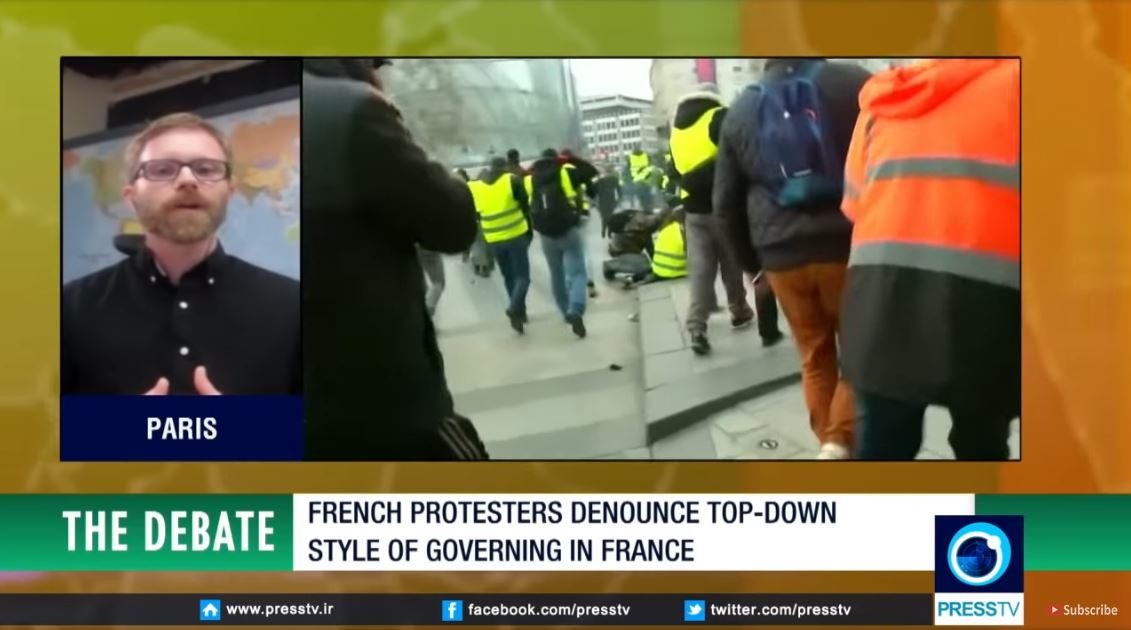 Click to enlarge Niall Braldy presstv paris protests