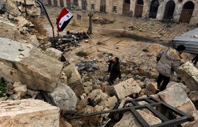 Syria flag rubble mosque