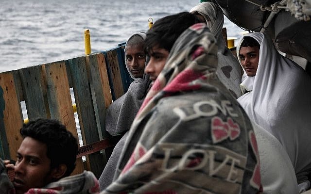 Click to enlarge Migrants