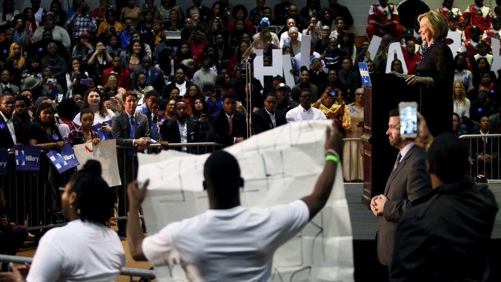 Black African American protests Hillary Clinton