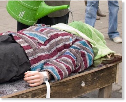 Click to enlarge Photo of waterboarding demonstration