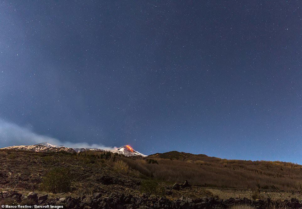 The large gas cloud also spread away from the site of the eruption, which lit up the local area with an orange glow.