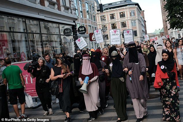 denmark protests face veil ban