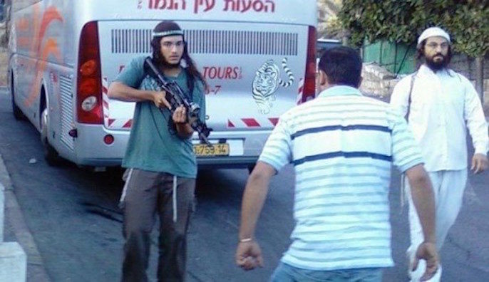 armed israeli settlers attack Palestinians
