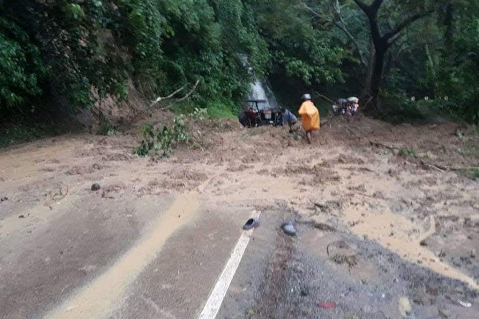 Mud and rock block a highway in Sta. Elena town, Camarines Norte.