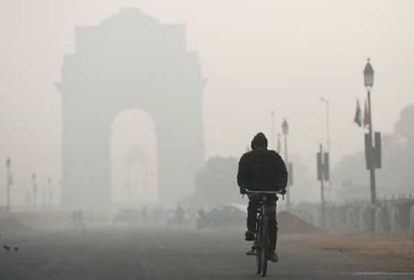 Click to enlarge Man rides his bicycle