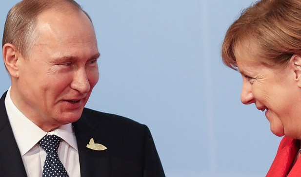 Click to enlarge Putin and Merkel