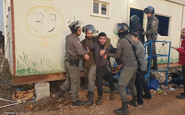 Click to enlarge Settlers evicted illegal amona settlement