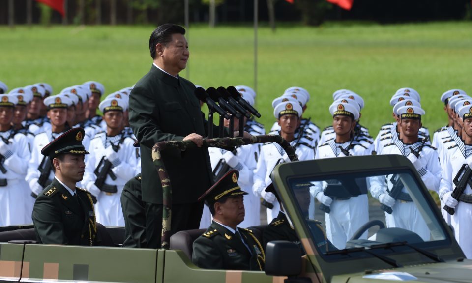 Click to enlarge Chinese President Xi Jinping reviews troops
