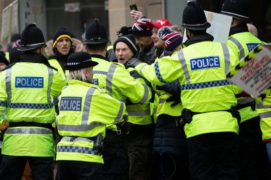 Click to enlarge police UK yellow vests