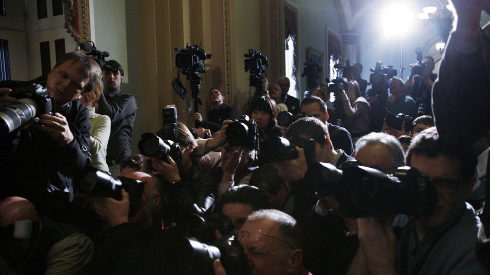 journalists scrum reporters