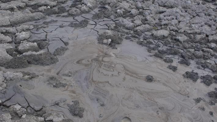 A mud volcano is an eruption of mud, cold water and gases.