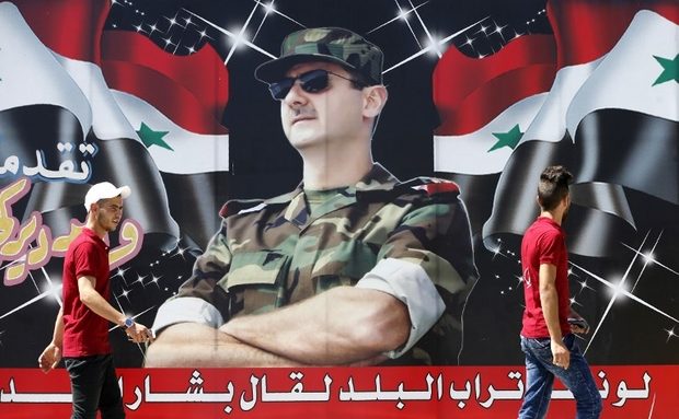 Click to enlarge Assad Billboard