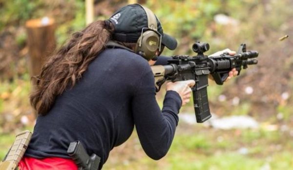 woman with gun