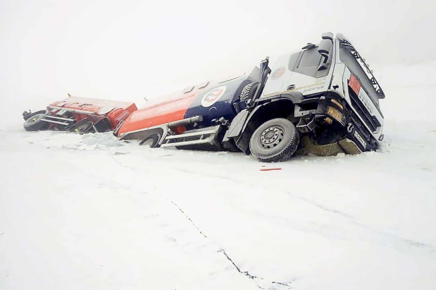 Click to enlarge A petrol truck lies partially through the ice on the Aldan River while driving along an authorised river crossing site near the Megino-Aldan settlement in the Tomponsky District