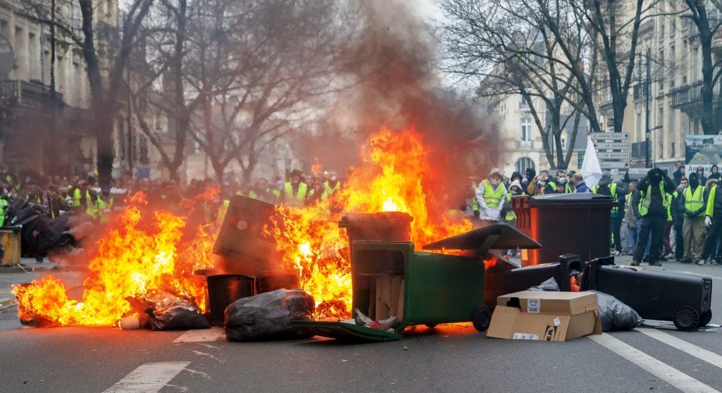 yellow vests burning barricade