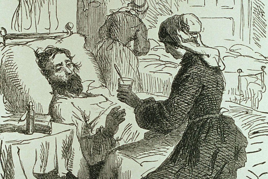 Click to enlarge A woman tending to a sick man