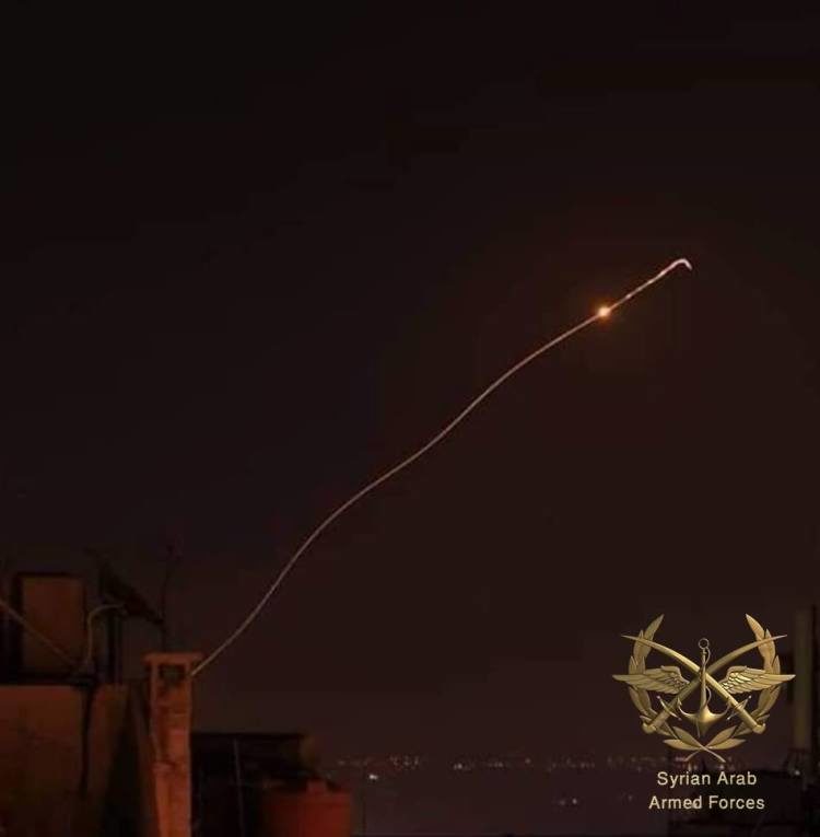 Syrian air defences hit an Israeli missile