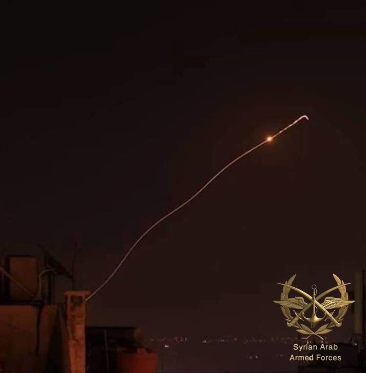 Click to enlarge Syrian air defences hit an Israeli missile