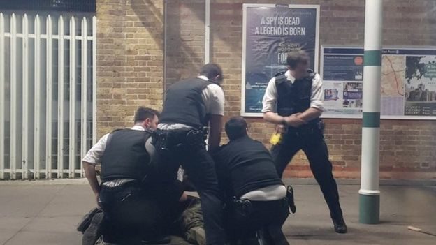 Click to enlarge Tulse Hill Station police man machete