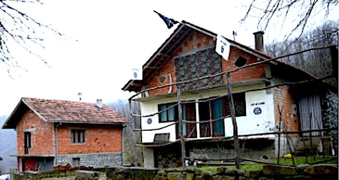 Click to enlarge suspect house