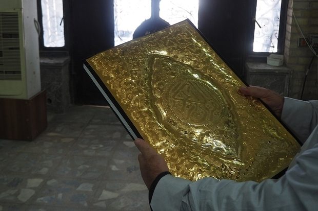 Click to enlarge gold covered Quran