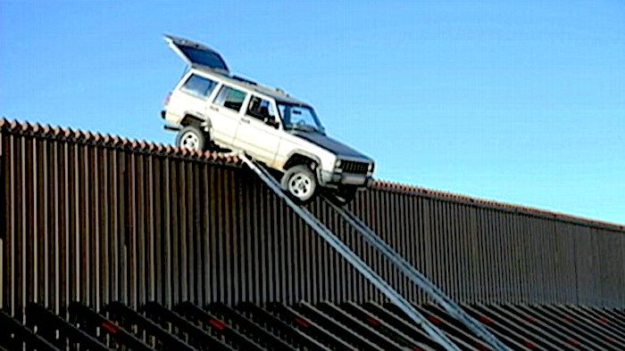 car on fence