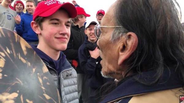 Click to enlarge native protest child maga hat