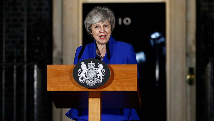 Click to enlarge Theresa May