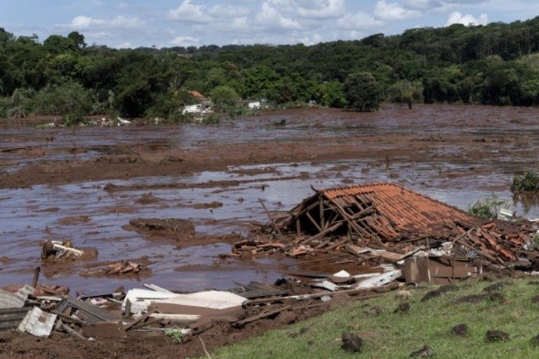 Click to enlarge A structure lays in ruins after a dam collapsed near Brumadinho, Brazil