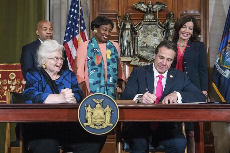 Click to enlarge Cuomo bill signing