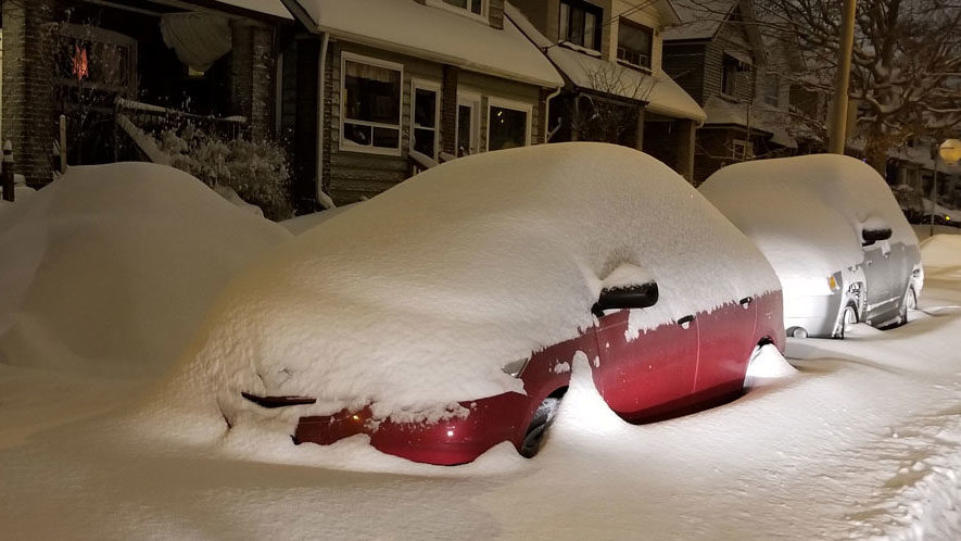Cars are buried in snow in Toronto on Jan. 29, 2019