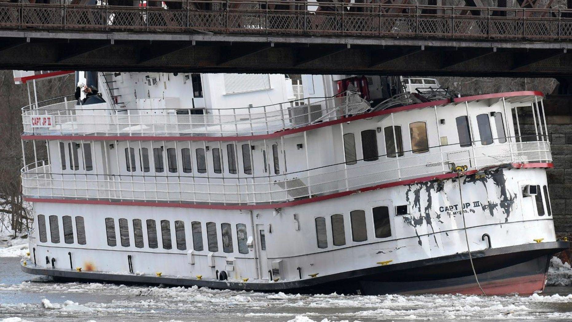 Captain JP III cruise ship is wedged against