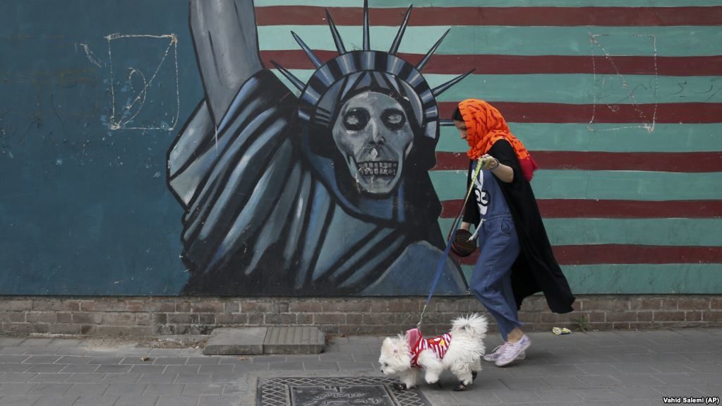 Click to enlarge Iranian dog walker