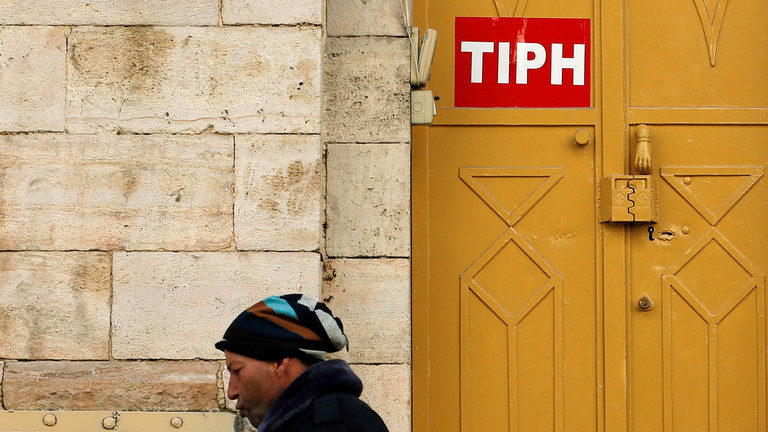 Click to enlarge Sign of the Temporary International Presence in Hebron