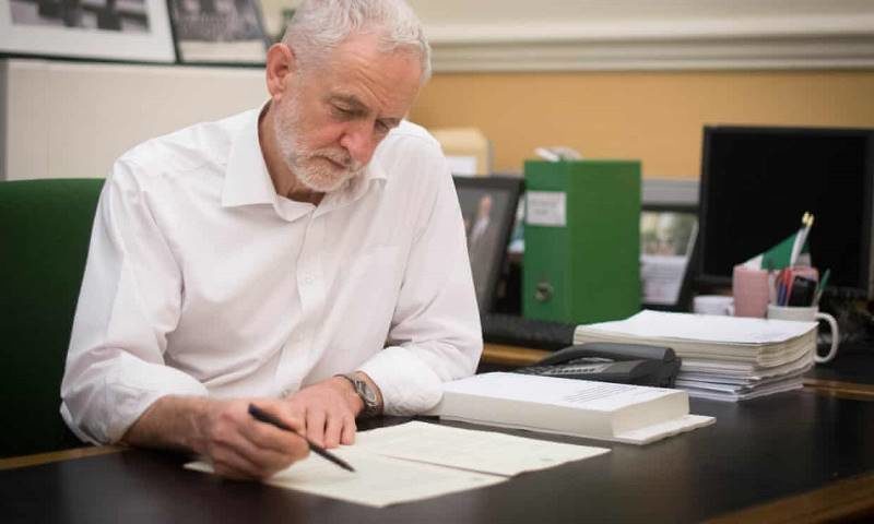 Click to enlarge corbyn at office desk