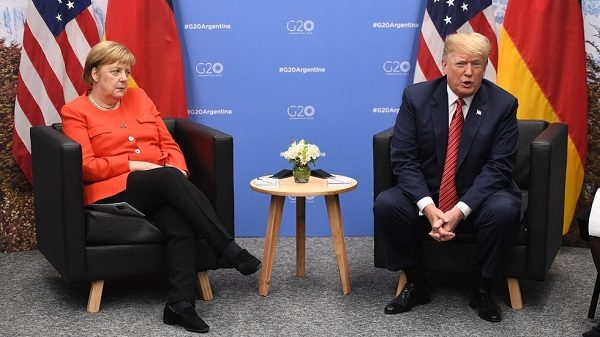 Click to enlarge Merkel and Trump