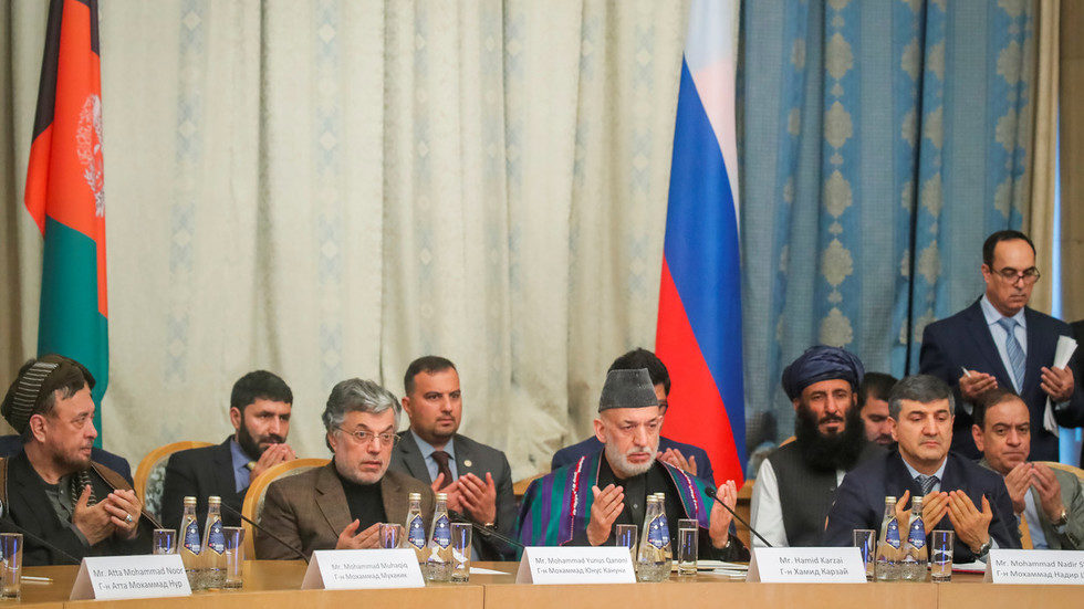 Click to enlarge Karzai
