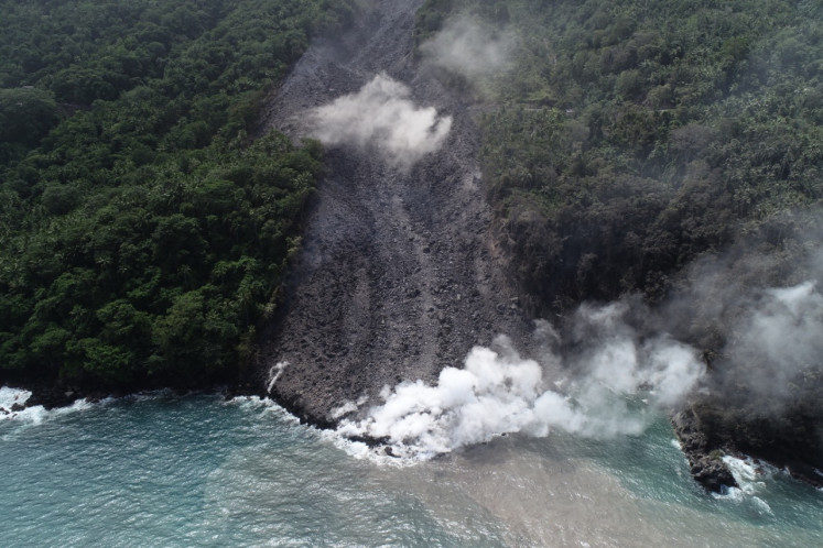 A flow of lava from one of the craters of Mount Karangetang in Siau Island, North Sulawesi.