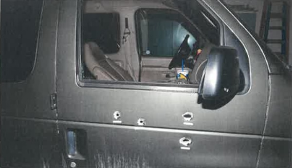Four bullets struck the passenger door