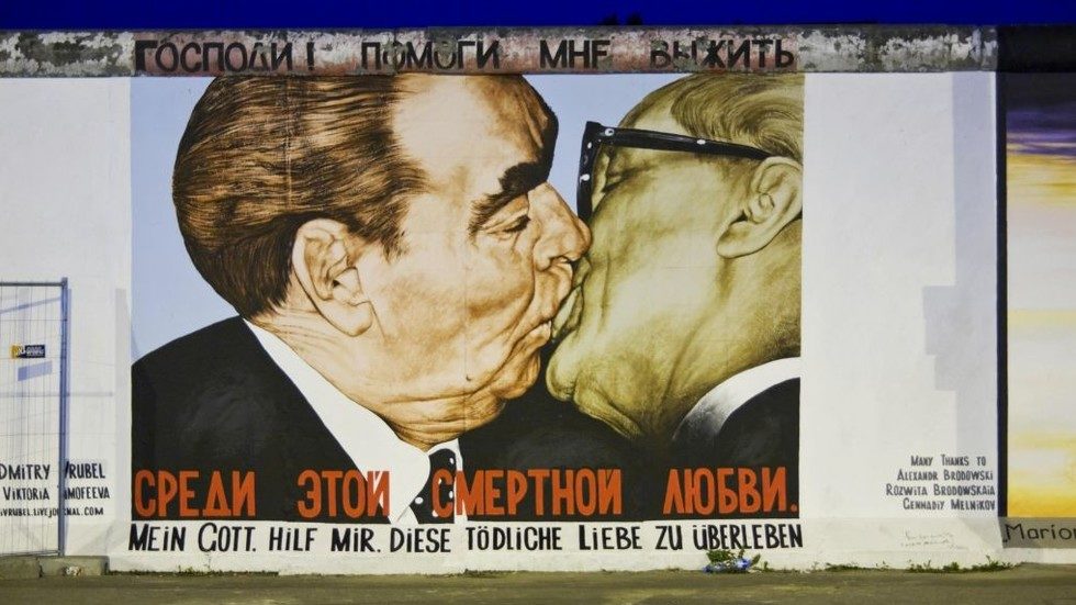 A segment of the graffiti painted wall at the East Side Gallery in Berlin