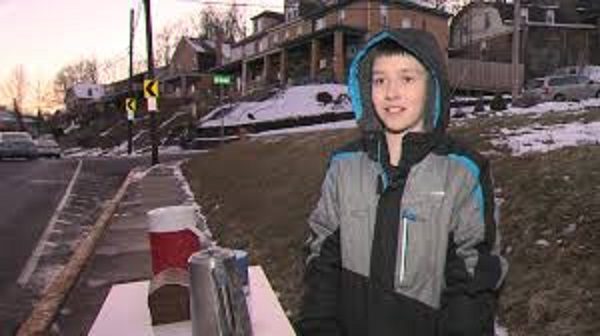 Boy selling hot chocolate